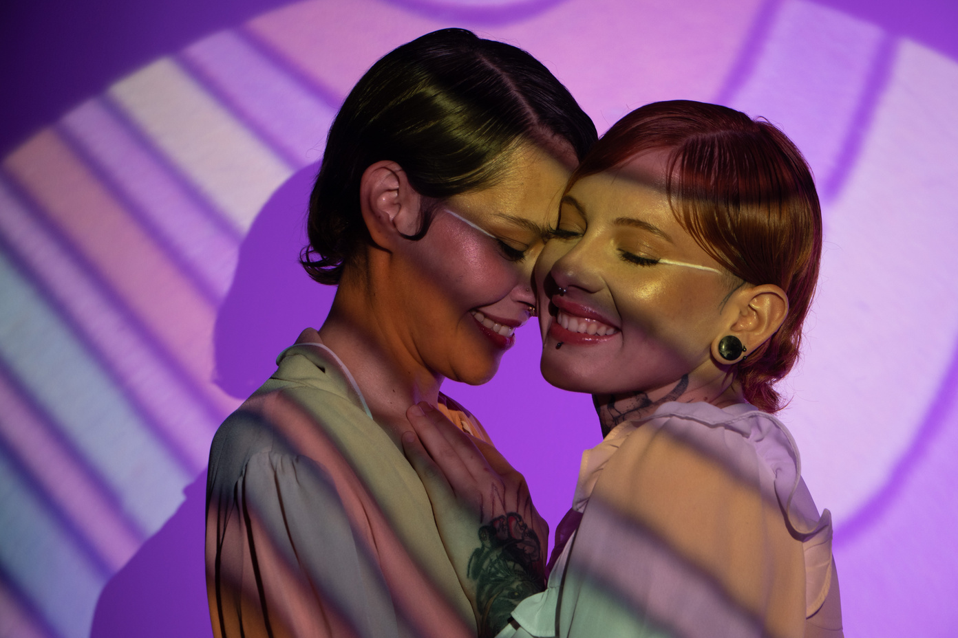 Happy LGBTQ Couple on Colorful Projections